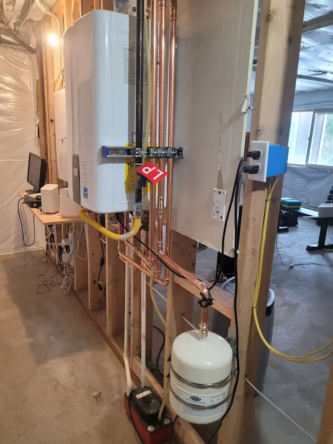 Licensed plumber repairing a kitchen sink in Trumann